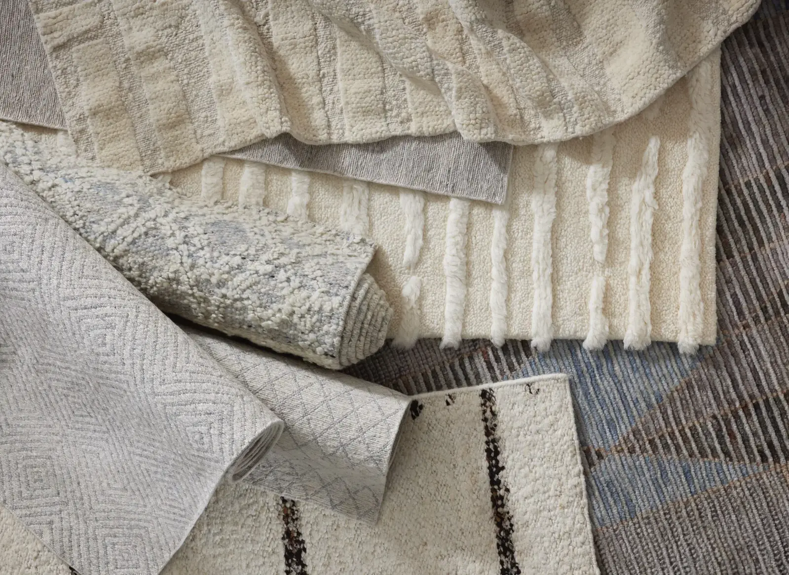 Jara wool carpet from Luxe by Kaleen in a warm cozy room setting with neutral cream and brown decor