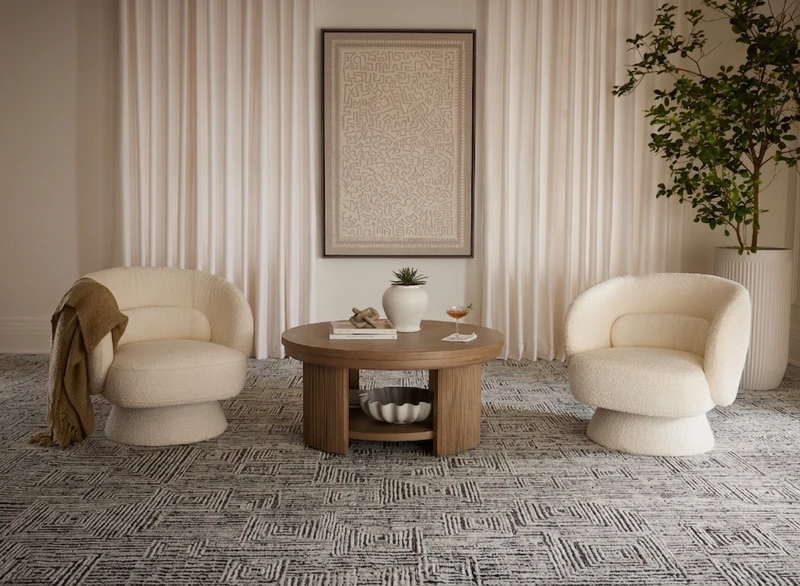 Close-up view of Kaleen’s Nectar collection wool carpet, featuring an intricate, tonal geometric pattern woven into a soft, textured surface