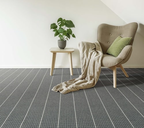 medium grey and white stripe wool carpet with neutral chair and table