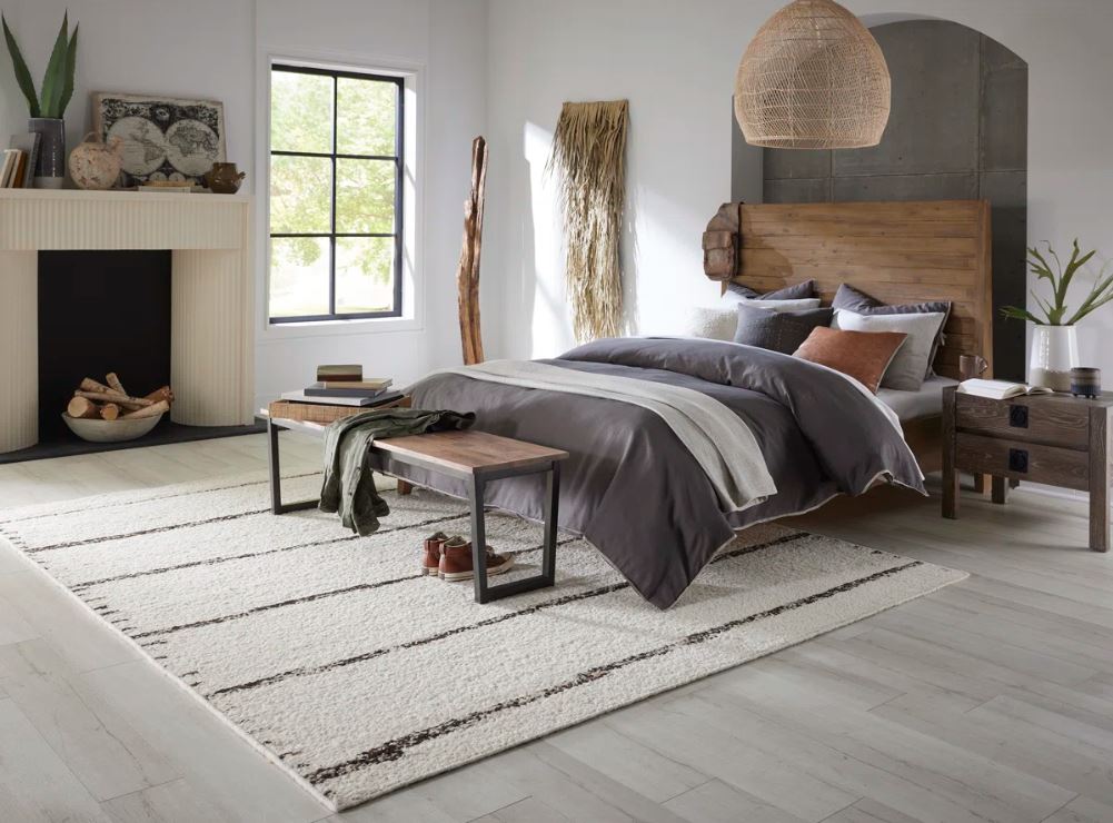 Ivory Wool Rug from the Luxe collection by Kaleen in the master bedroom.