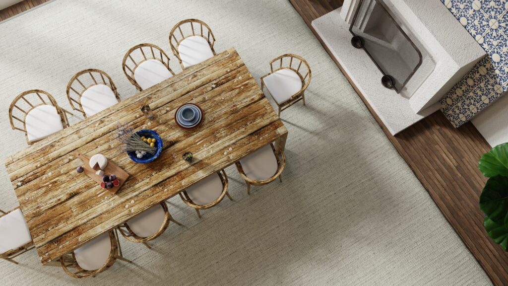 Rustic rectangle dining room table highlighted with a custom rug from Kaleen